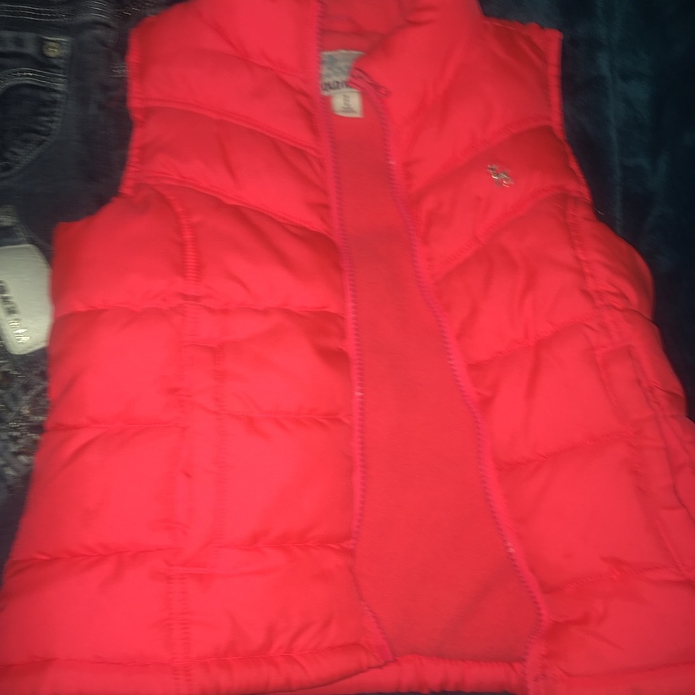 Bright orange/pink puffer vest